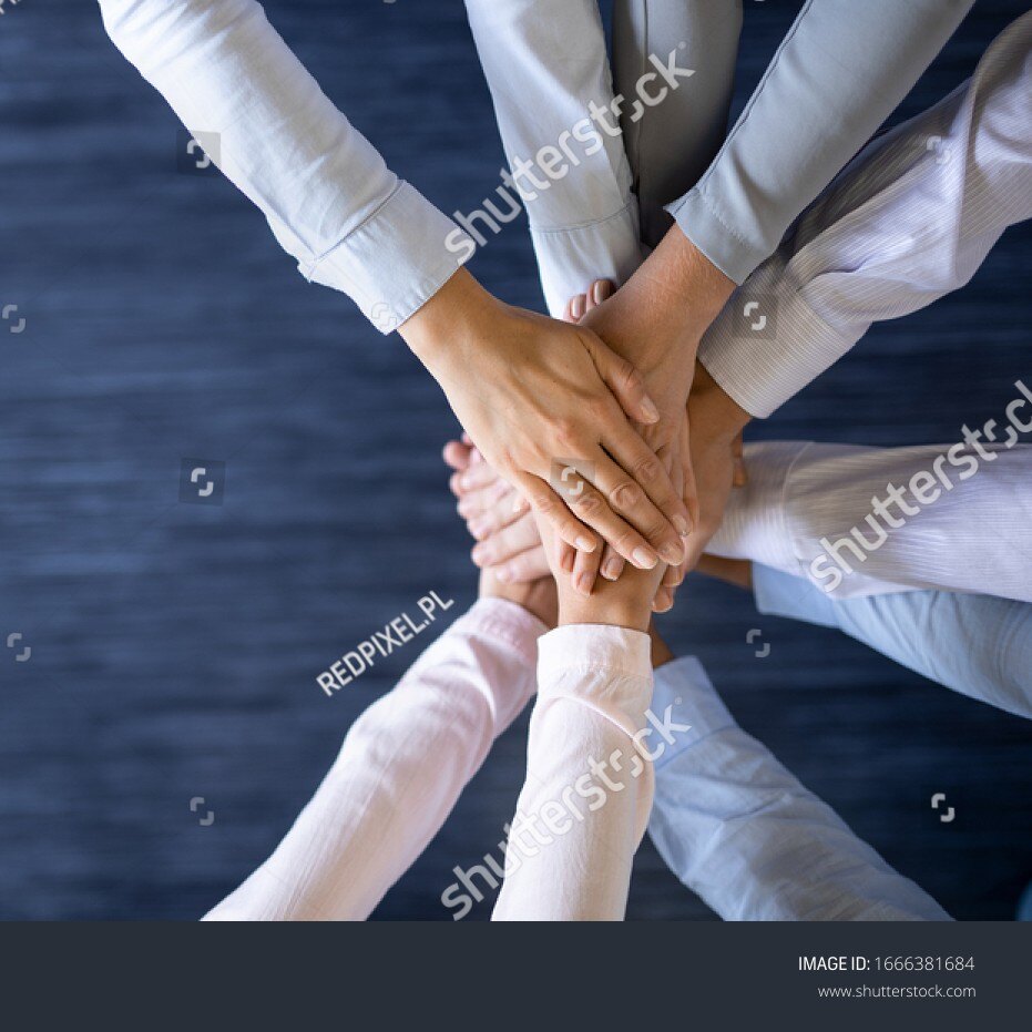 stock-photo-close-up-top-view-of-young-business-people-putting-their-hands-together-stack-of-hands-unity-and-1666381684