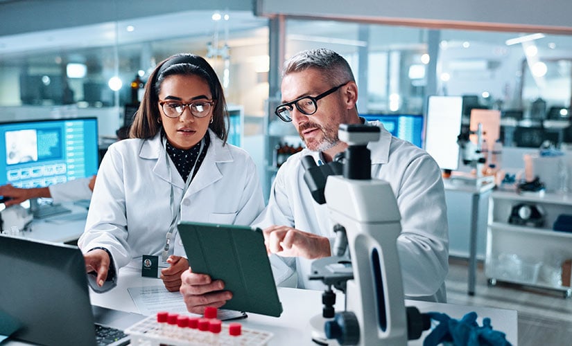 Scientists maintaining pharmaceutical data integrity in compliance with EU GMP Chapter 4