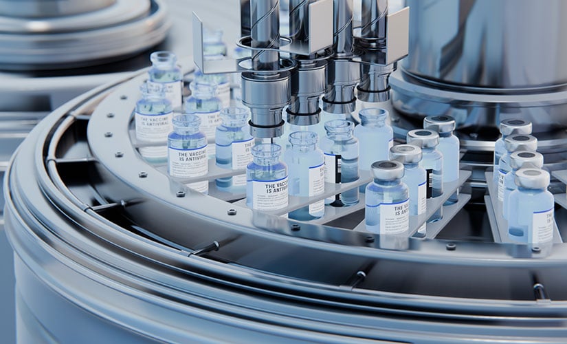 Vials of medicine lined up and being filled in a manufacturing facility. Potency tracking software for strengthening batch control and traceability.