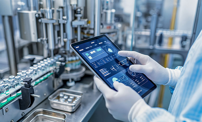 Medical device manufacturer uses software on tablet to monitor quality and production. Image for FDA QMSR webinar recap answering common questions about the new QMSR rule.